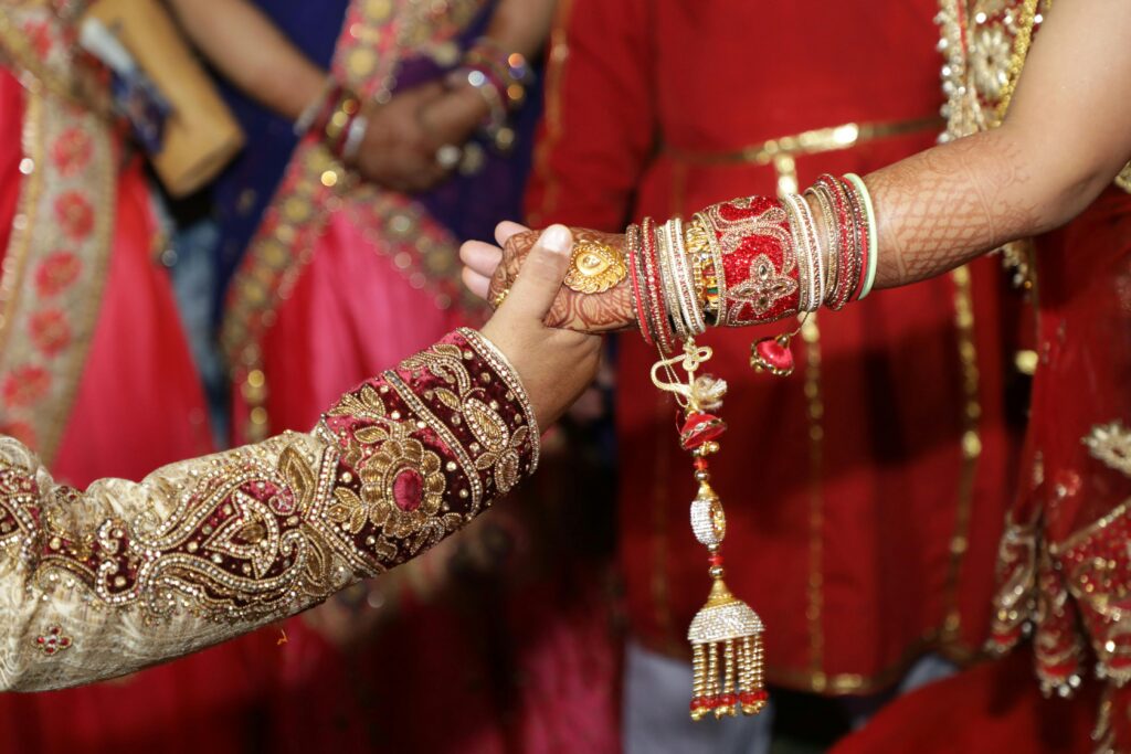 Close-up of a vibrant Indian wedding ceremony showcasing traditional attire and jewelry in Jaipur.