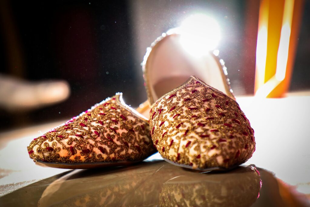 Beautiful embroidered Indian shoes with intricate designs, perfect for special occasions.